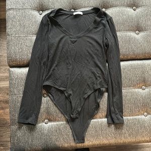 Mangopop women’s body suit size large. Color black.